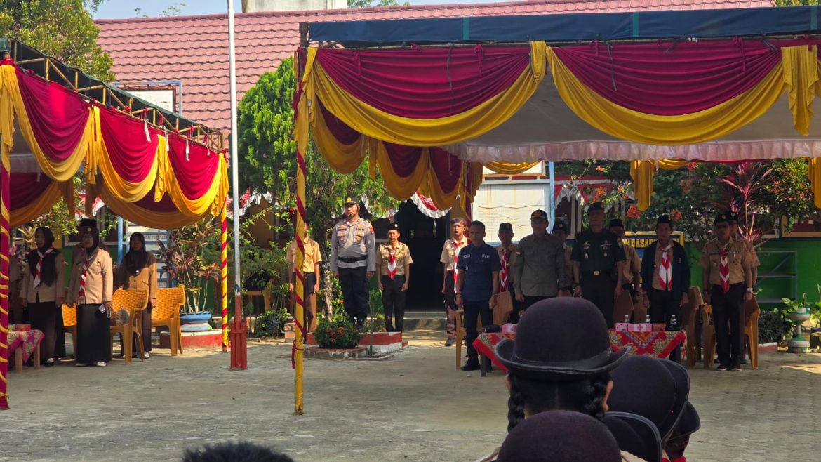 Kapolsek Rambang Jadi Pembina Upacara HUT Pramuka ke-64, Tekankan Peran Pramuka Dalam Membentuk Generasi Tangguh Dan Berkarakter