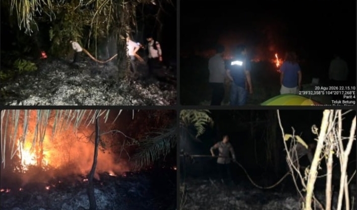 Polsek Pulau Rimau Bersama Brimob dan Warga Padamkan Karhutla di TPU Desa Teluk Be